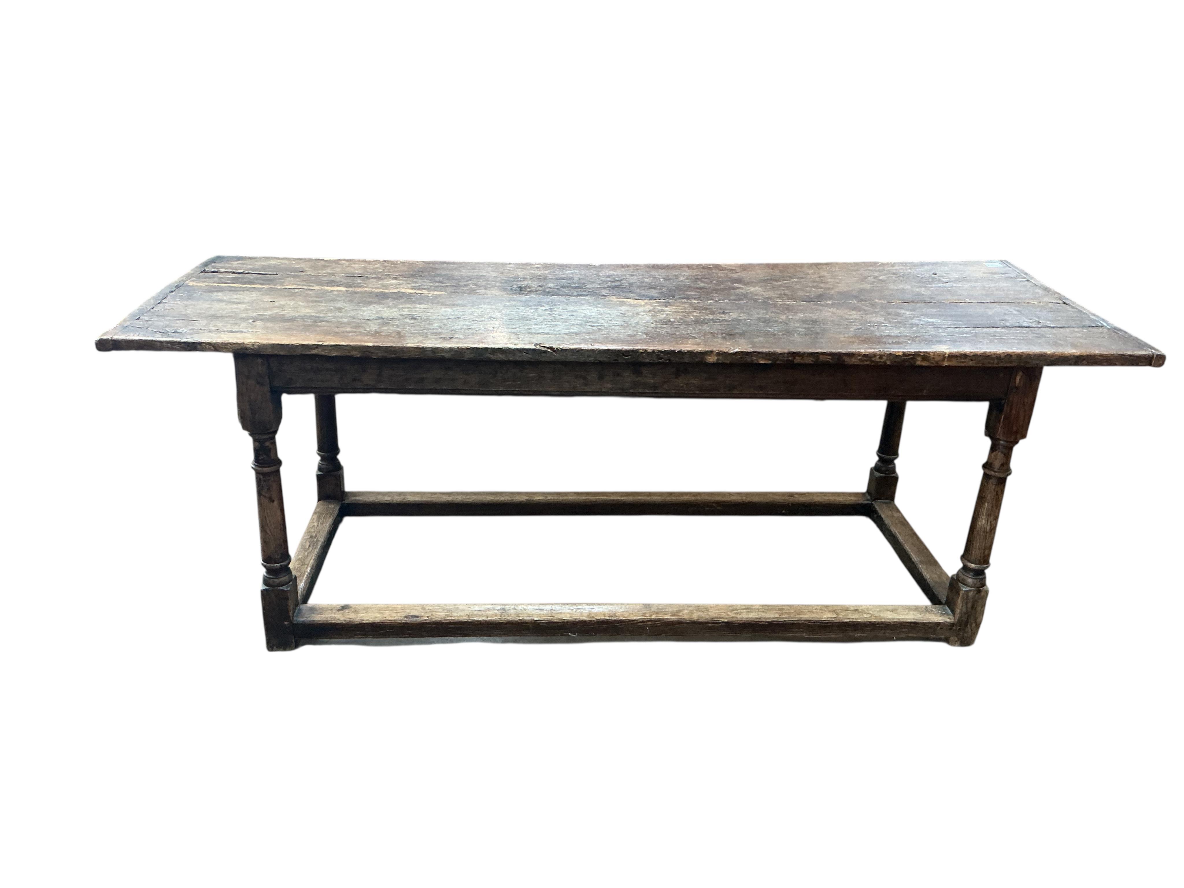 A 17th century and later rectangular oak refectory dining table, width 212cm, depth 75cm, height 77cm